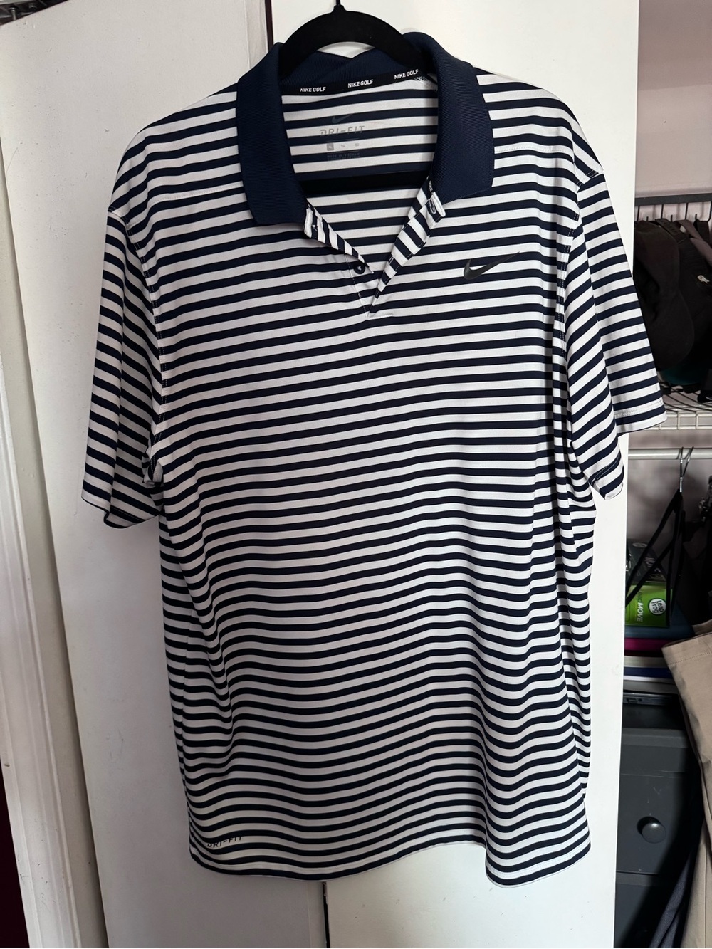 Nike Men's Navy and White Striped Polo Shirt